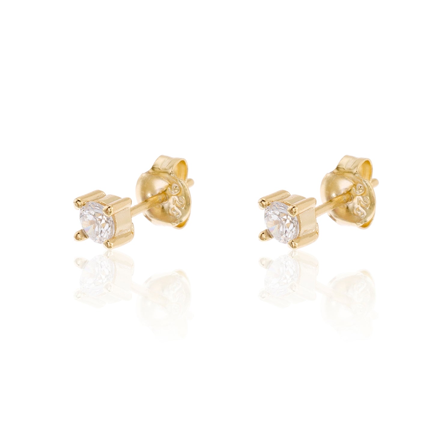 pendientes de brillante solitario redondo con circonitas que parecen de diamantes buenos. El material es plata de ley bañada en oro 18 kilates y son hipoalergénicos. Gold plated sterling silver round zircon diamond earrings