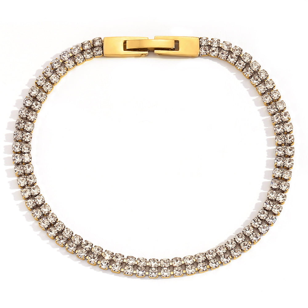 pulsera tenis de brillantes en acero hipoalergenico con baño de oro y circonitas. Gold plated stainless steel tennis zircon rhinestone bracelet