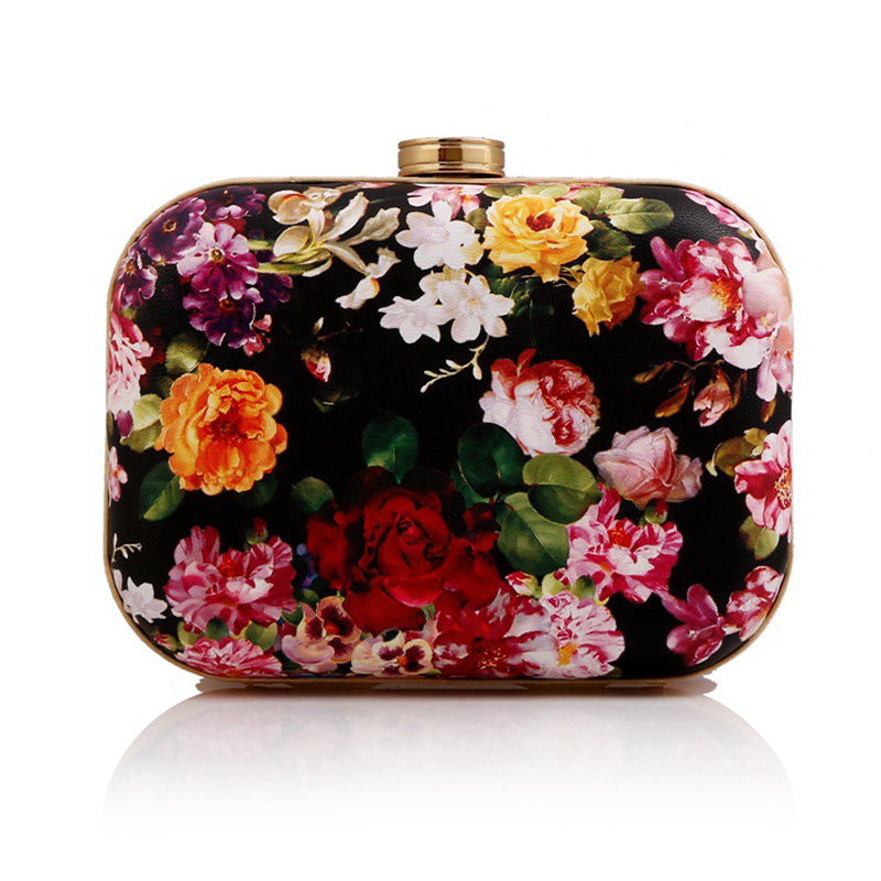 Clutch con estampado de flores para invitadas a boda