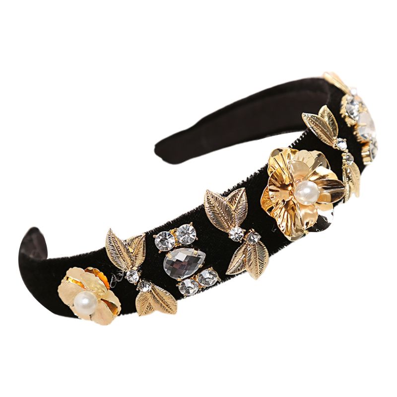 diadema negra estilo doce gabbana con flores y hojas de metal dorado para invitada a boda perfecta e ideal