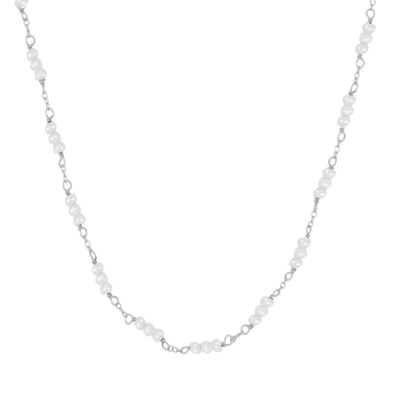 GARGANTILLa personalizada con perlas pequeñas de río o perlitas que se puede llevar tipo chocker y está confeccionada en plata de ley con baño de oro 18 kilates