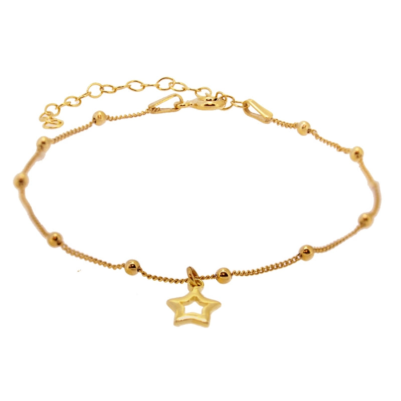 pulsera de cadena de bolitas y estrella confeccionada en plata de ley y bañada en oro 18 kilates