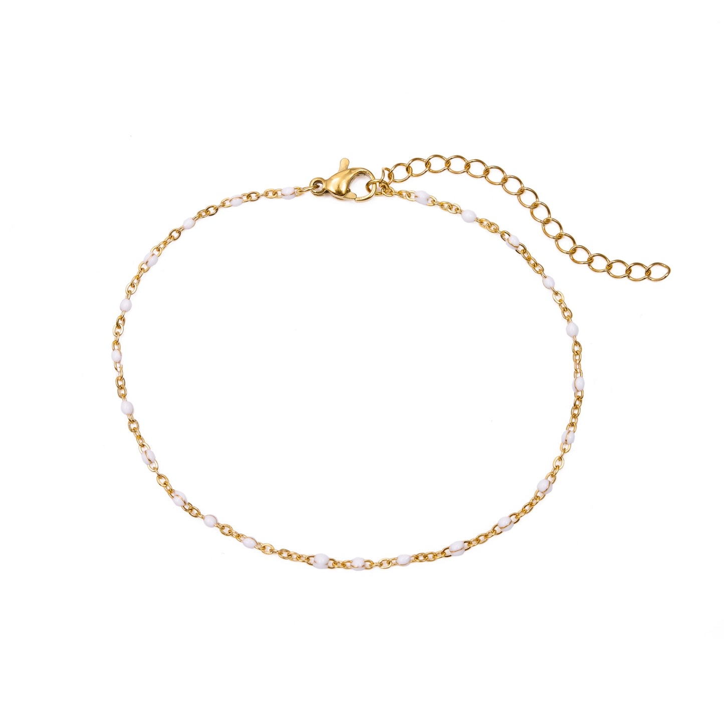 tobillera waterproof o resistente al agua confeccionada en acero con baño de oro de 3 micras. Tiene bolitas de enamel color blanco y el cierre es ajustable. golden stainless steel white bead anklet chain