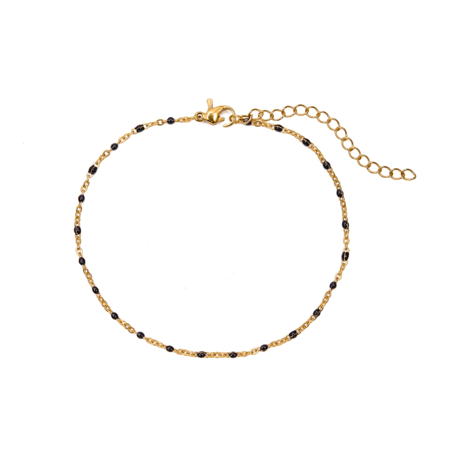 tobillera waterproof o resistente al agua confeccionada en acero con baño de oro de 3 micras. Tiene bolitas de enamel color negro y el cierre es ajustable. golden stainless steel black bead anklet chain