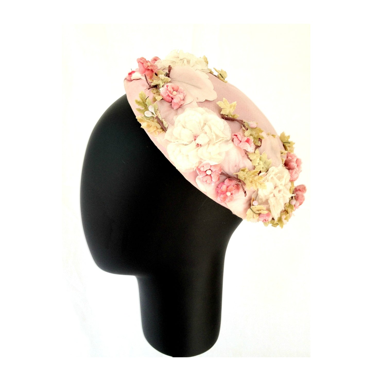 Tocado o casquete vintage con flores rosas para invitada a boda