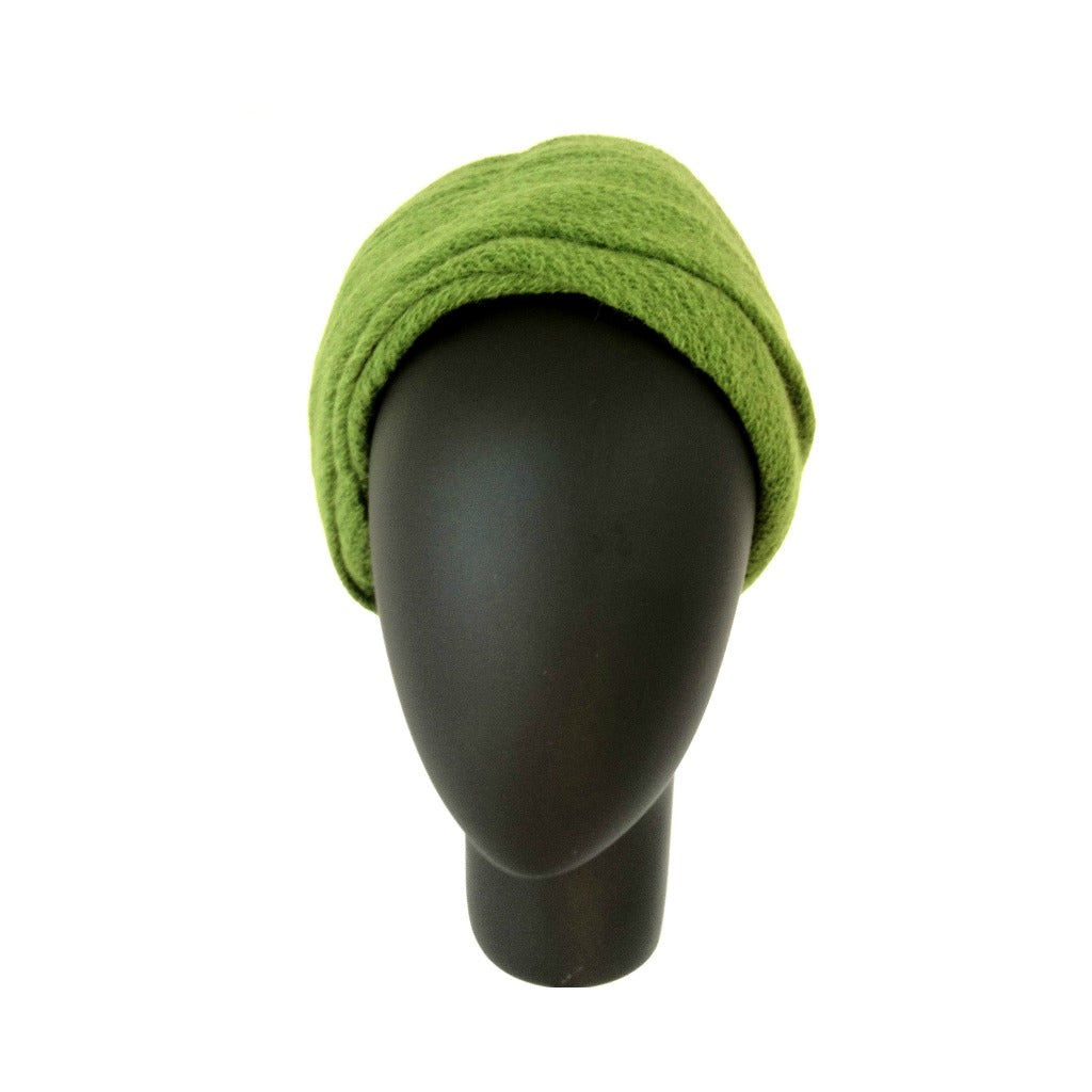 Tocado de turbante verde pistacho para alquilar estilo Máxima de Holanda