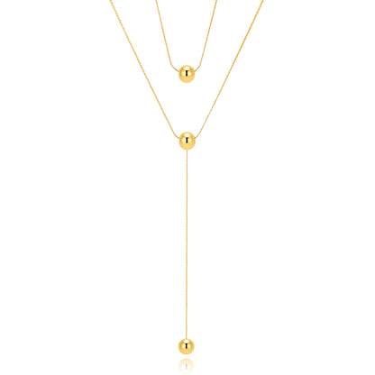 collar largo boho para adolescente o mujer joven que lleve escote en v o escote pronunciado. es de cadena larga con bolas colgantes. ideal para looks de noche o de fiesta. Es de acero hipoalergénico dorado o plateado y resistente al agua
