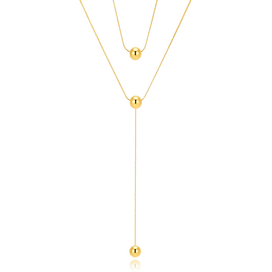 collar largo boho para adolescente o mujer joven que lleve escote en v o escote pronunciado. es de cadena larga con bolas colgantes. ideal para looks de noche o de fiesta. Es de acero hipoalergénico dorado o plateado y resistente al agua