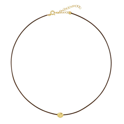 collar de hilo o cordón en color marrñon con bolita plateada o dorada. Gold plated sterling silver bead brown thread necklace.