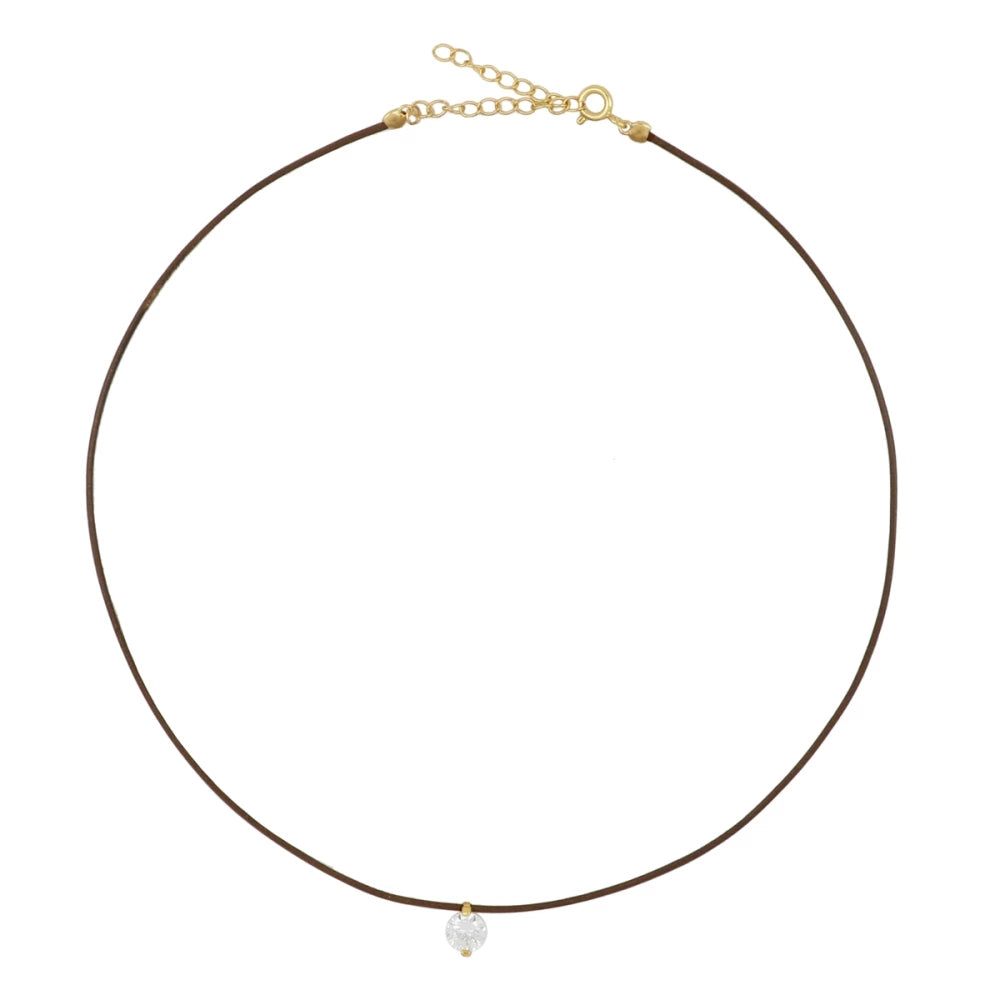 collar de hilo o cordón en color marron con brillante punto de luz. Gold plated sterling silver bead brown thread zircon necklace.