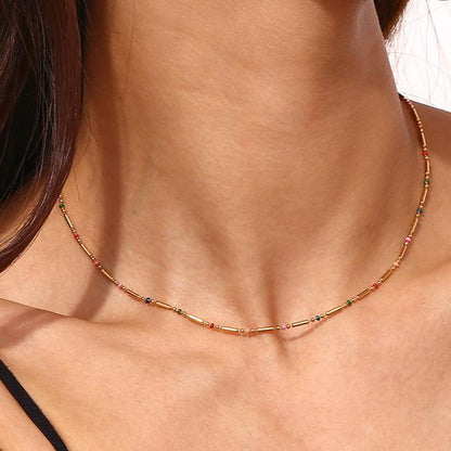 collar para verano de acero hipoalergénico resistente al agua dorado con bolitas de colores. Gold plated stainless steel color bead waterproof necklace for summer