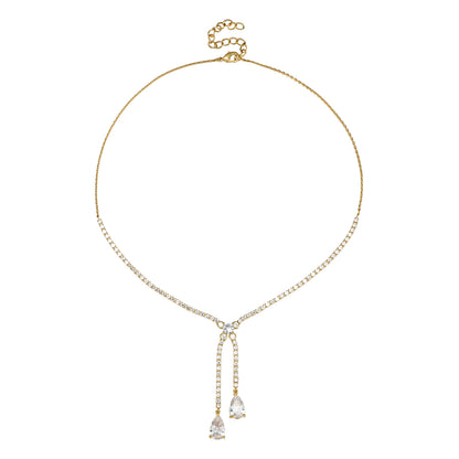 gargantilla o collar con cadena tenis de circontias y dos lagrimas brillante. Es de bronce con baño de oro 18 kilates. Gold plated bronze tenis necklace with pear shaped diamond drop