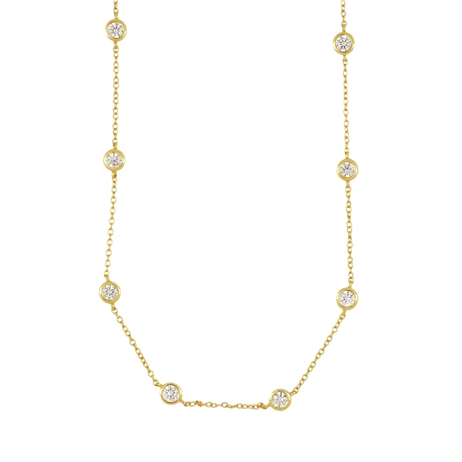 gargantilla de plata de ley con circonitas en círculo tipo punto de luz. Acabados en plata rodiada y baño de oro 18 kilates. Hipoalergénica. 