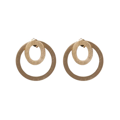 Pendientes de aros o círculos desmontables que son convertibles 2 en 1. Son huecos y resistentes al agua. Son de acero hipoalergénico y no pesan.