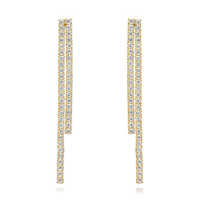 pendientes de fiesta largos con brillantes tipo tenis con estrella o sol. es de plata de ley con baño de oro 18 kilates. gold plated sterling silver long zircon tennis chain holiday earrings