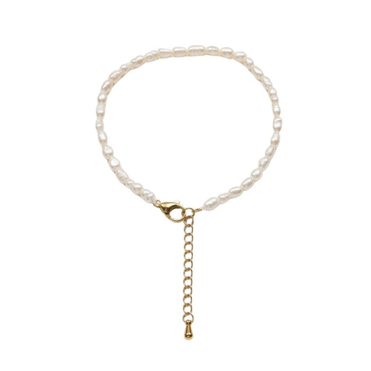 PULSERAS DE PERLA DE ARROZ CULTIVADA. SON DE ACERO HIPOALERGÉNICO Y RESISTENTE AL AGUA. sON UNAS PULSERAS DE PERLAS PEQUEÑAS Y FINAS PAR REGALAR EN EL DÍA DE LA MADRE, DE AMIGO INVISIBLE O PARA UNA PRIMERA COMUNIÓN.