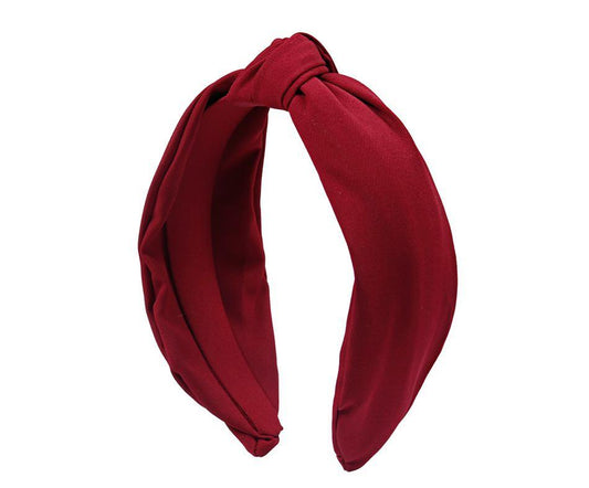 Diadema de tela con nudo en color rojo oscuro o granate