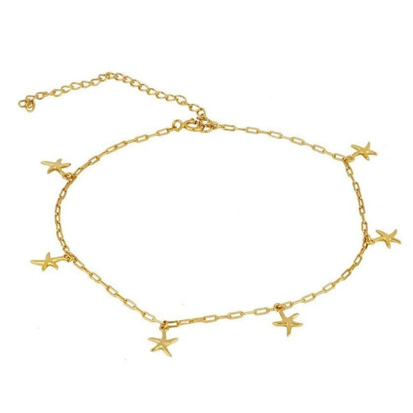tobillera de plata de ley con baño de oro y 6 estrellas de mar. Gold plated silver anklet with starfish charms.
